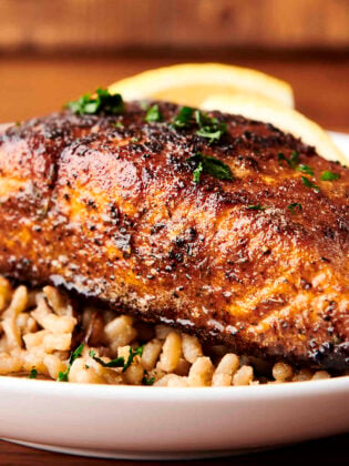 blackened salmon on a bed of rice