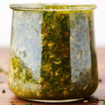 glass jar full of chimichurri sauce