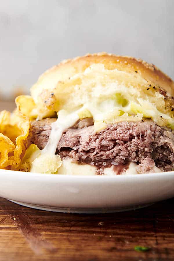 italian beef slider on a plate with chips