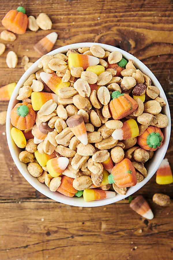 bowl of candy corn and peanut snack mix