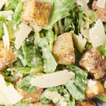 salad with homemade caesar salad dressing and croutons