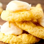 stack of cornbread cookies with honey buttercream frosting