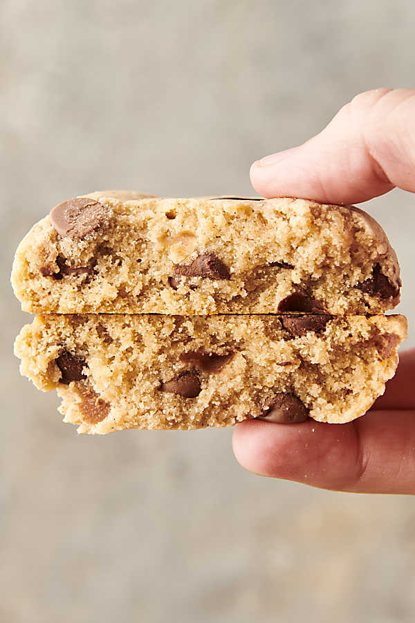 holding a brown butter chocolate chip cookie with pancake mix