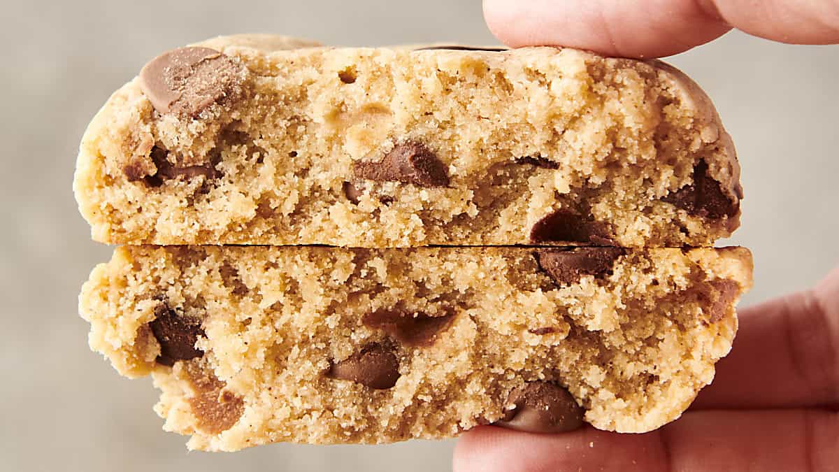 holding a bisquick chocolate chip cookie