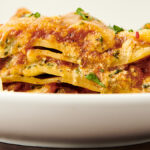 slice of healthy lasagna on plate