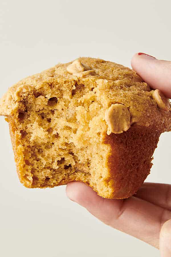 holding a soft peanut butter muffin
