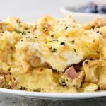 bacon cheese and cheese bagel breakfast casserole on a plate
