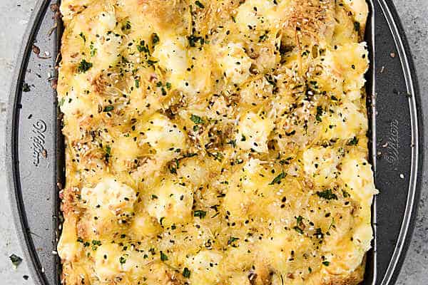baked bagel breakfast casserole in a pan