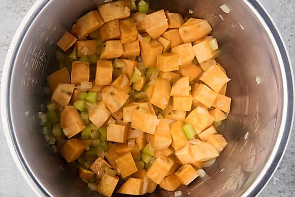 onion, celery, and sweet potato in instant pot