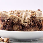 brown butter banana bread coffee cake with streusel and maple icing