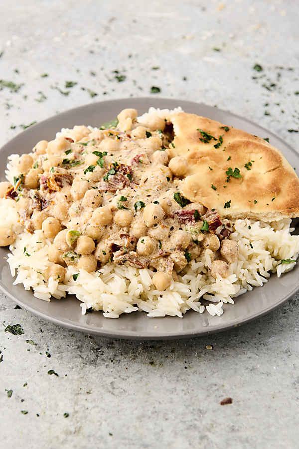 plate of marry me chickpeas with rice