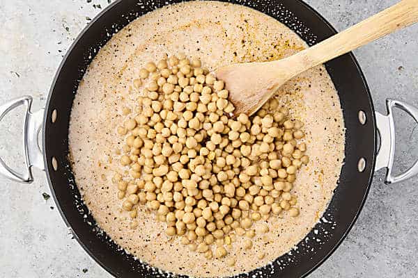 coconut milk and chickpeas in a pan