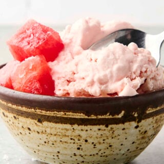 scooping into a bowl of no churn watermelon sherbet