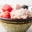 scooping into a bowl of no churn watermelon sherbet