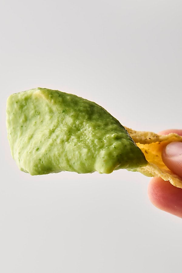 creamy avocado sauce on a chip