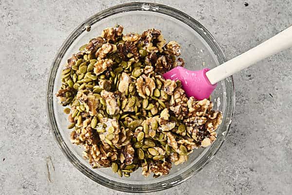 nuts and seeds folded into beaten egg whites