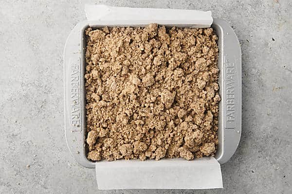 pumpkin crumb cake in a pan before baking