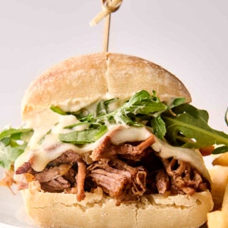 slow cooker french dip sandwich on a plate