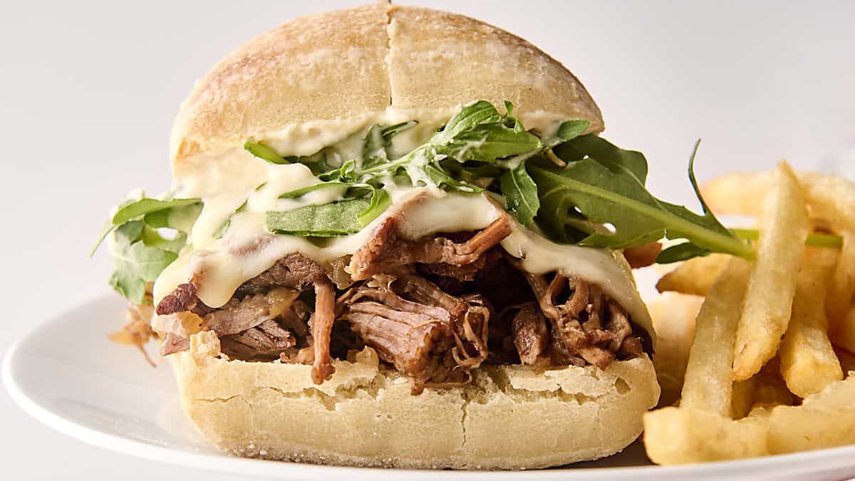 crockpot french dip sandwich on a plate