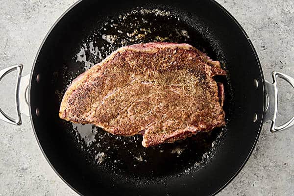 seared beef in a pan