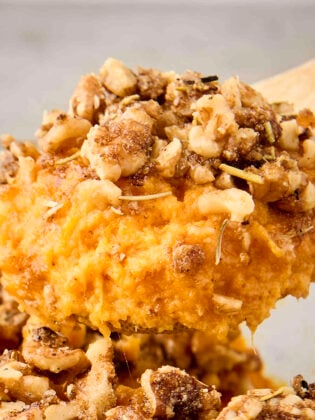 brown butter sweet potato casserole on a spoon