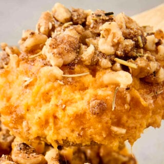 brown butter sweet potato casserole on a spoon