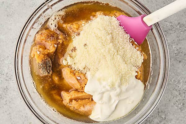mixing together sweet potato casserole filling