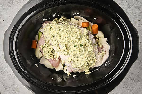 herb butter rubbed turkey in crockpot