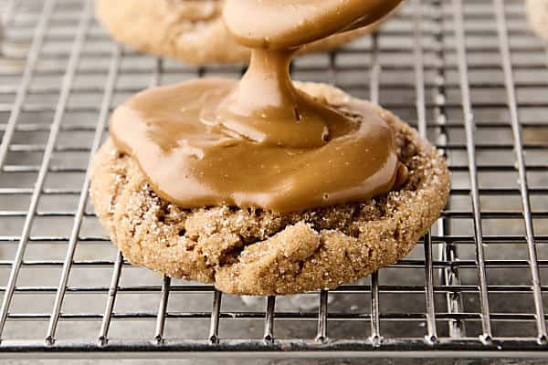 frosting the cooled cookies