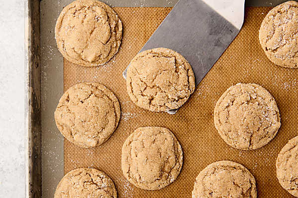 baked maple brown sugar cookies on a sheet pan