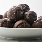 plate with chocolate covered date bites
