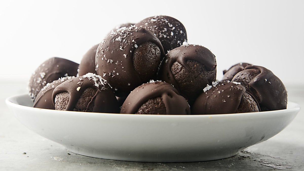 plate with chocolate covered date bites