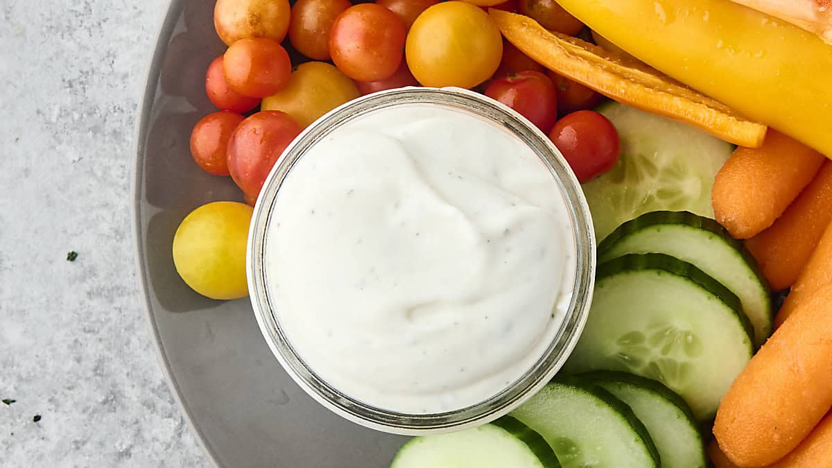 high protein low calorie ranch dressing recipe on a plate with fresh vegetables