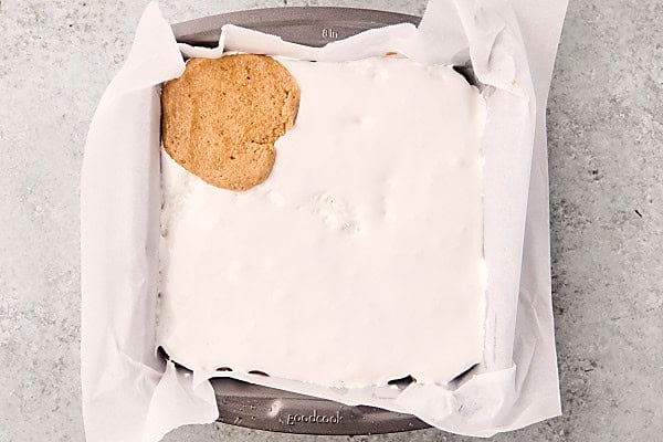 one flattened cookie dough chunk on top of marshmallow fluff