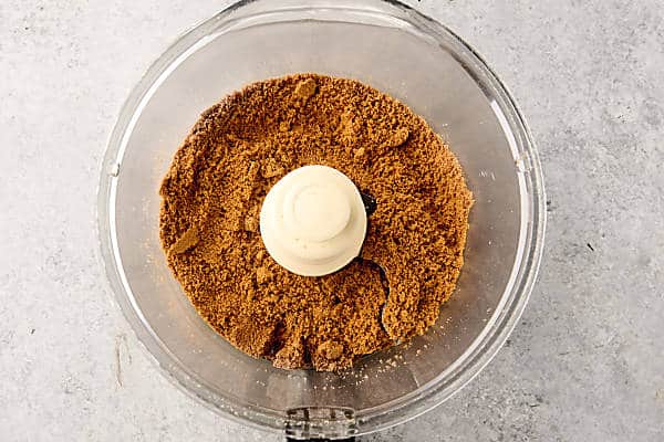 biscoff cookie crumbs in food processor