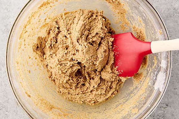 cookie dough with crushed biscoff cookies in a bowl
