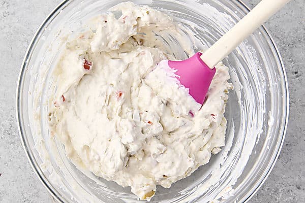 cream cheese base of martini dip in a bowl