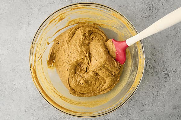pumpkin muffin batter in a bowl