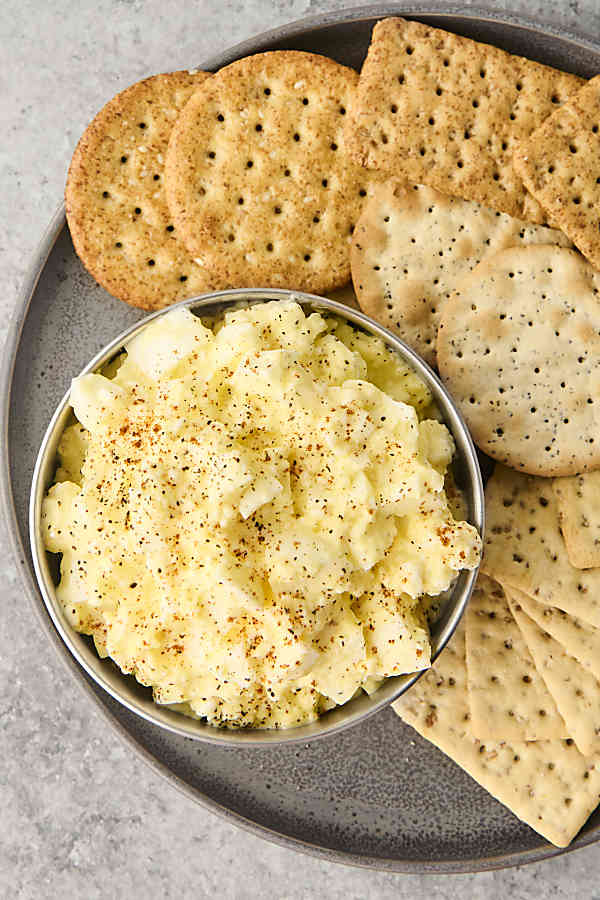 high protein egg salad in a bowl served with crackers