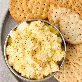 bowl of cottage cheese egg salad with crackers