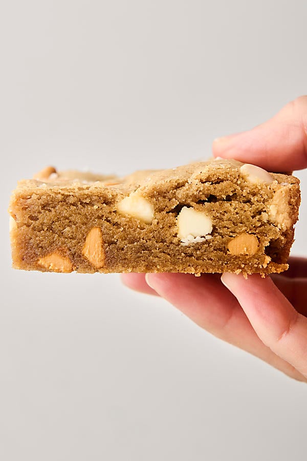 holding a brown butter butterscotch blondie