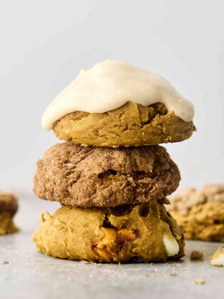 stack of cake mix pumpkin cookies with different mix-ins and toppings