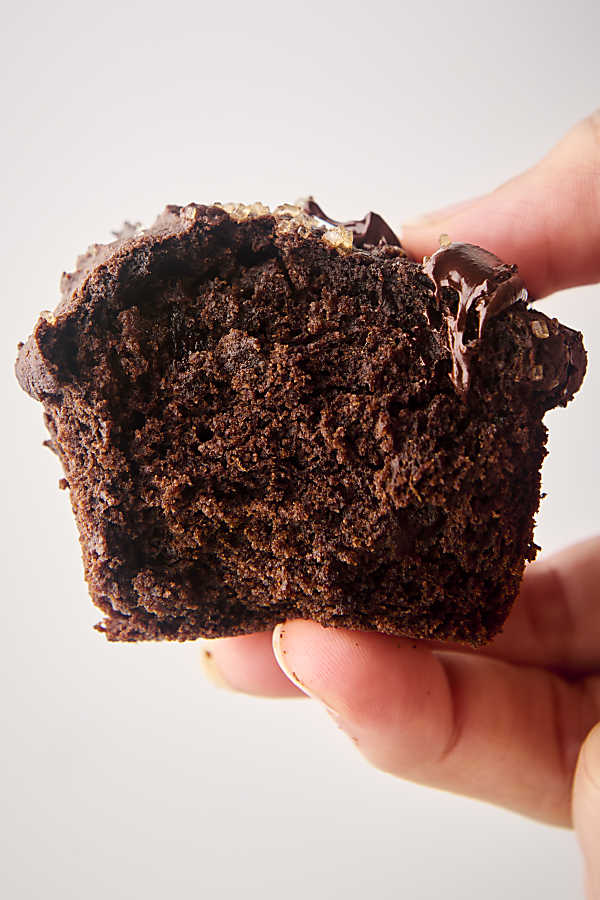 showing the inside of a double chocolate pumpkin muffin