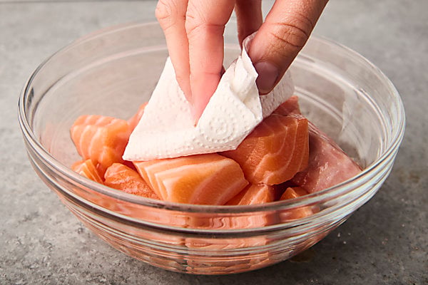 patting salmon dry